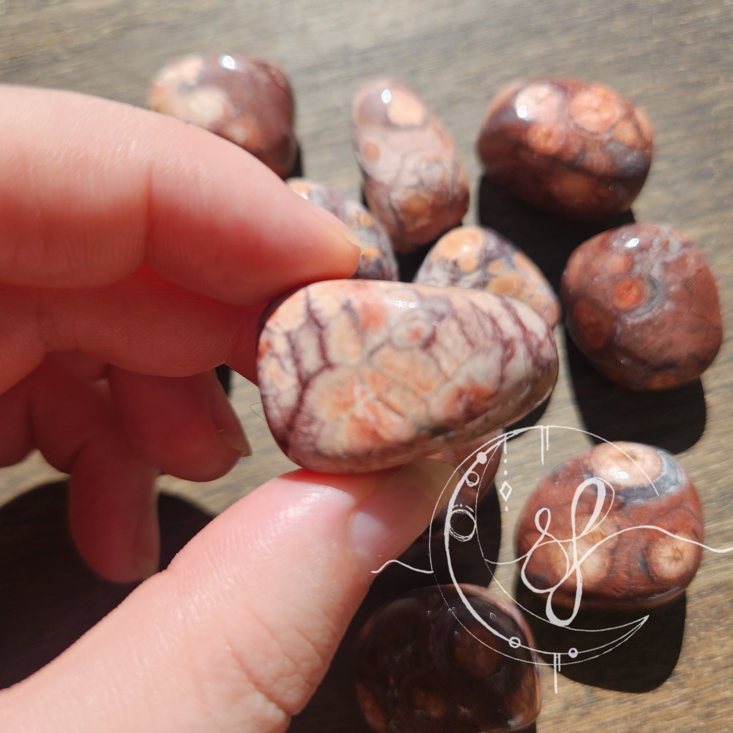 Hand cut birds eye jasper tumbles