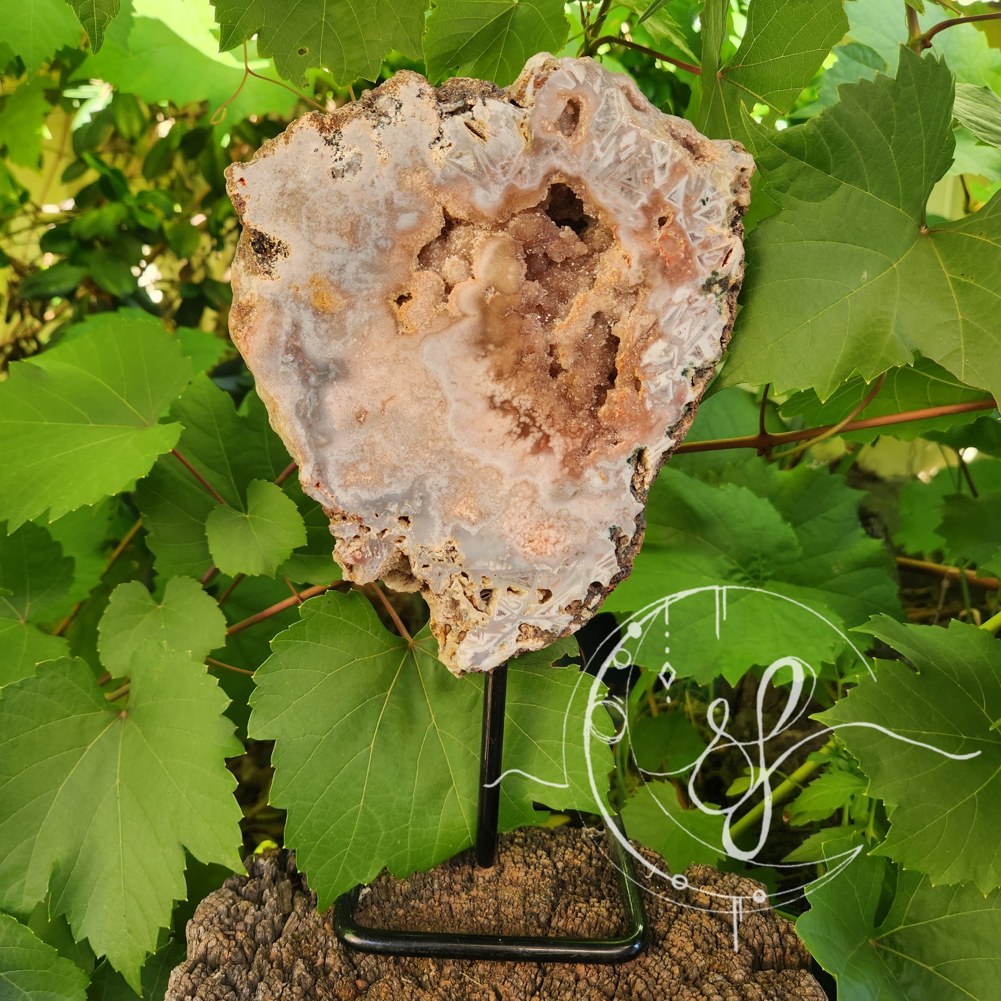 High grade brazilian pink amethyst slab on stand she fire