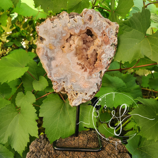 High grade brazilian pink amethyst slab on stand she fire