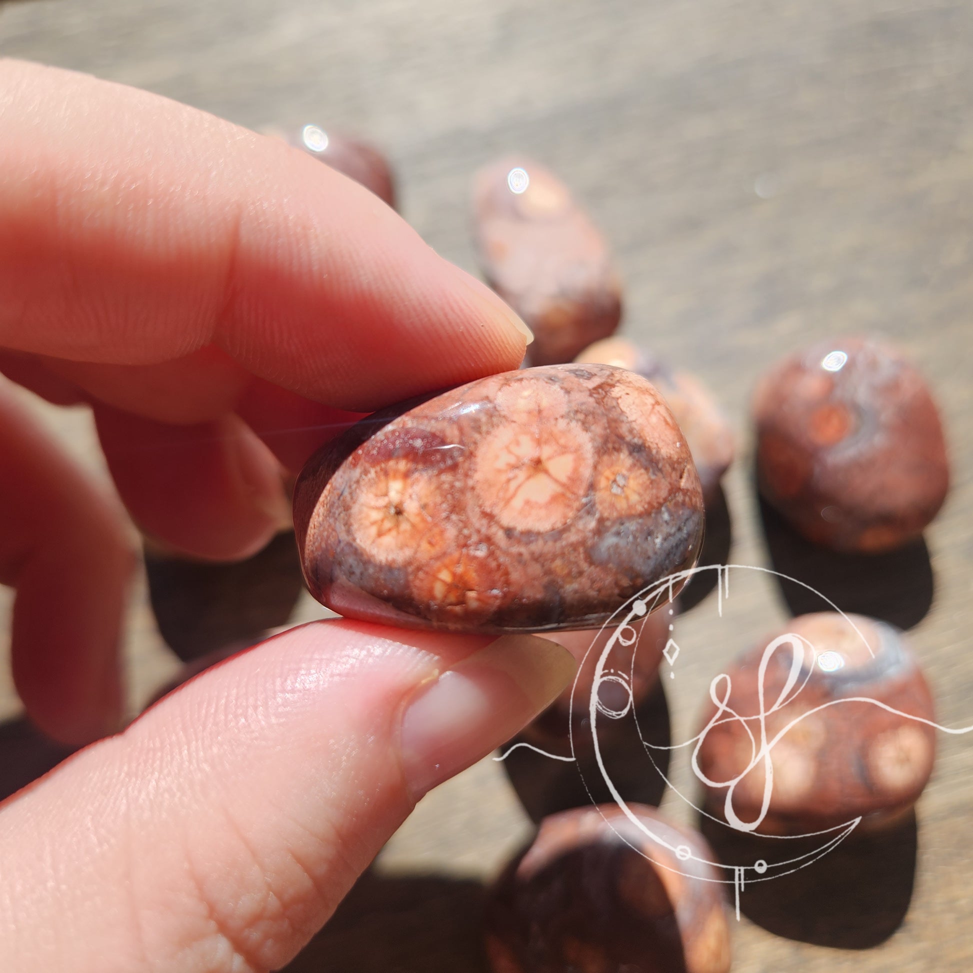 Hand cut birds eye jasper tumbles
