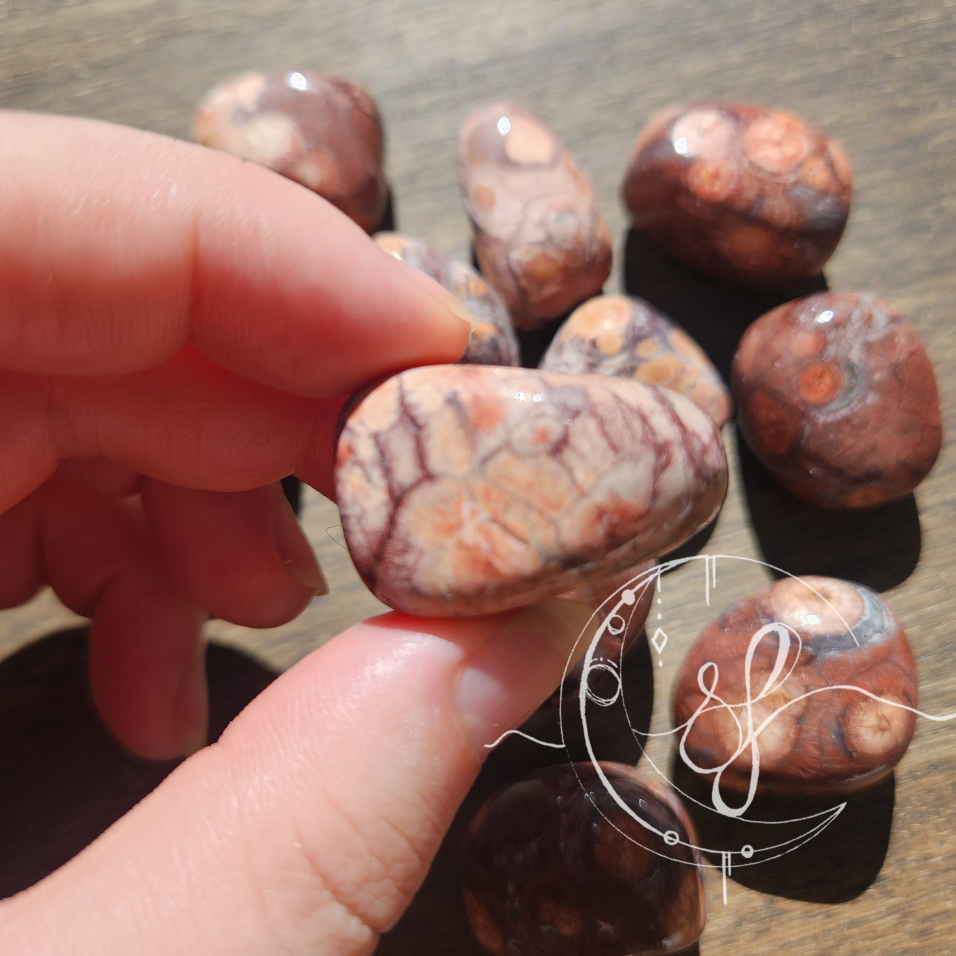 Hand cut birds eye jasper tumbles