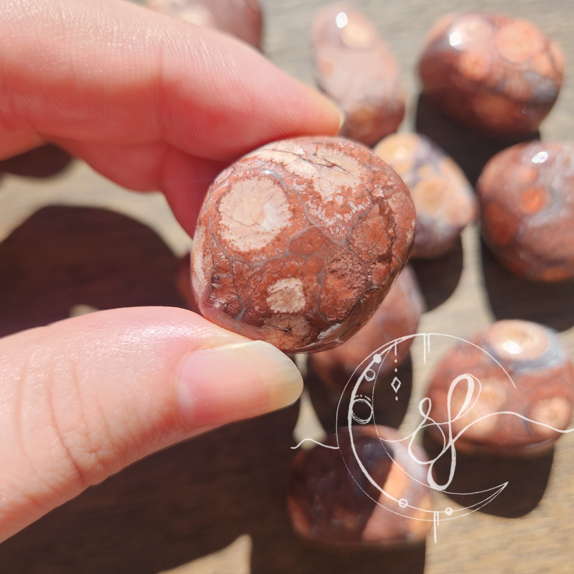 Hand cut birds eye jasper tumbles