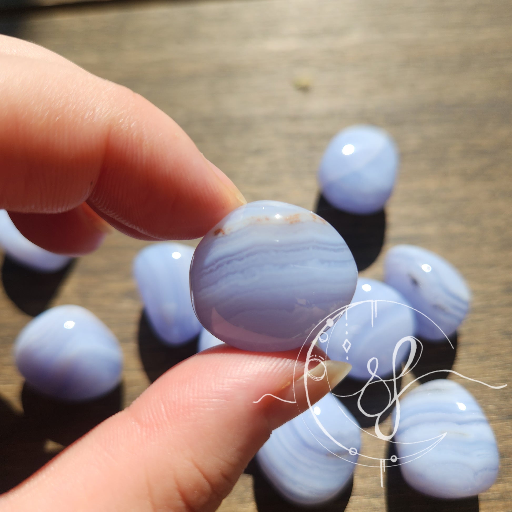 Highest grade hand cut blue lace agate tumbles she fire