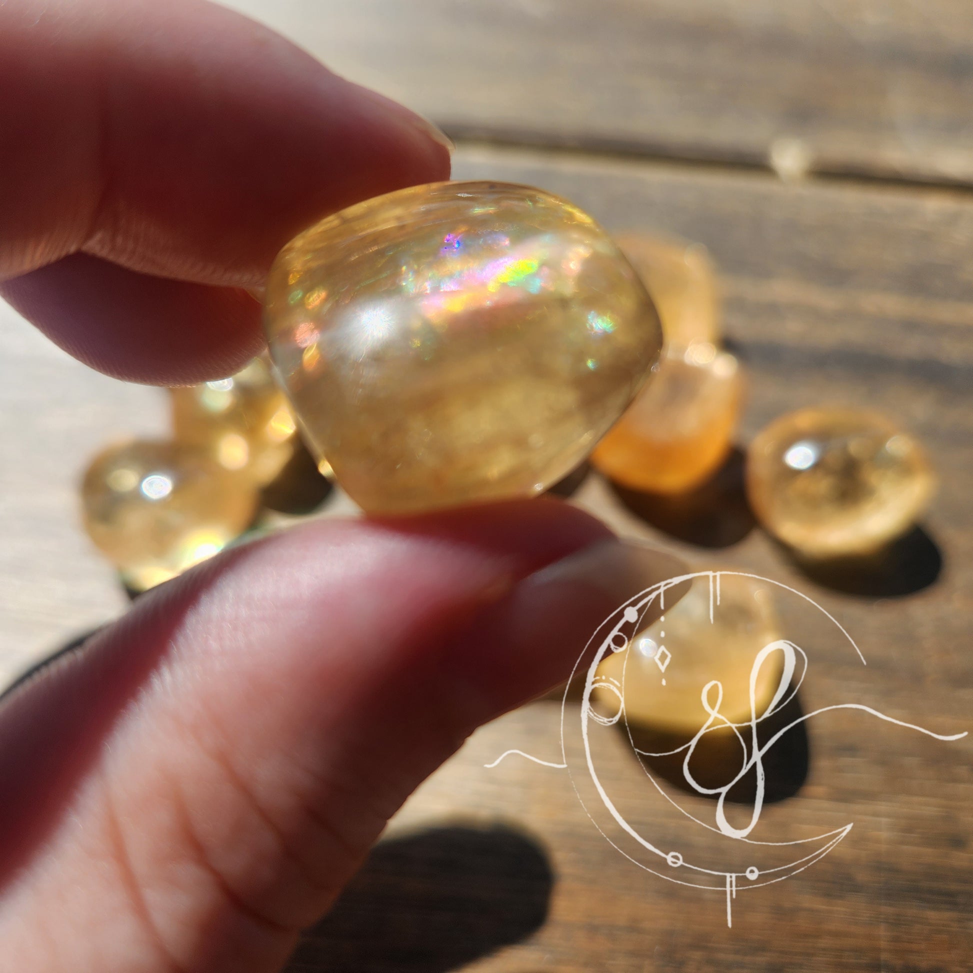Hand cut golden rainbow yellow calcite she fire