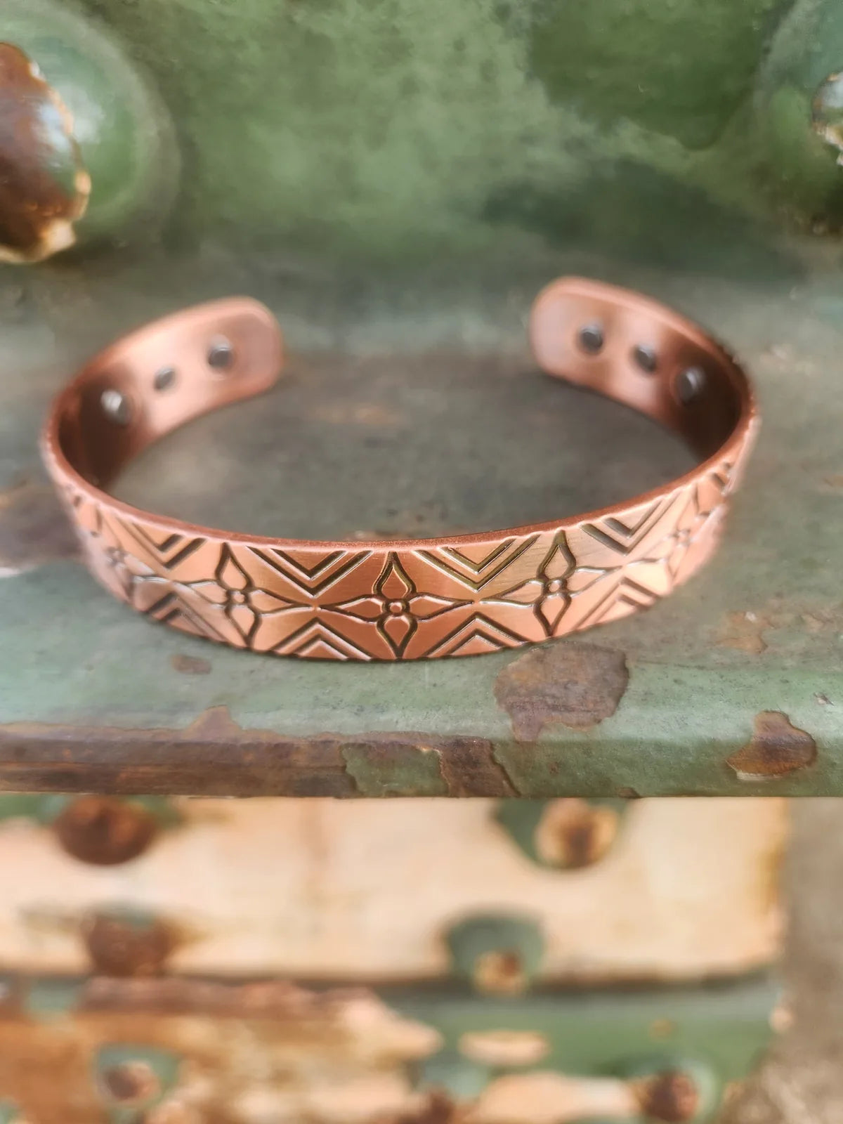99.99% pure copper magnetic cuff bracelet with engraved geometric floral pattern front view